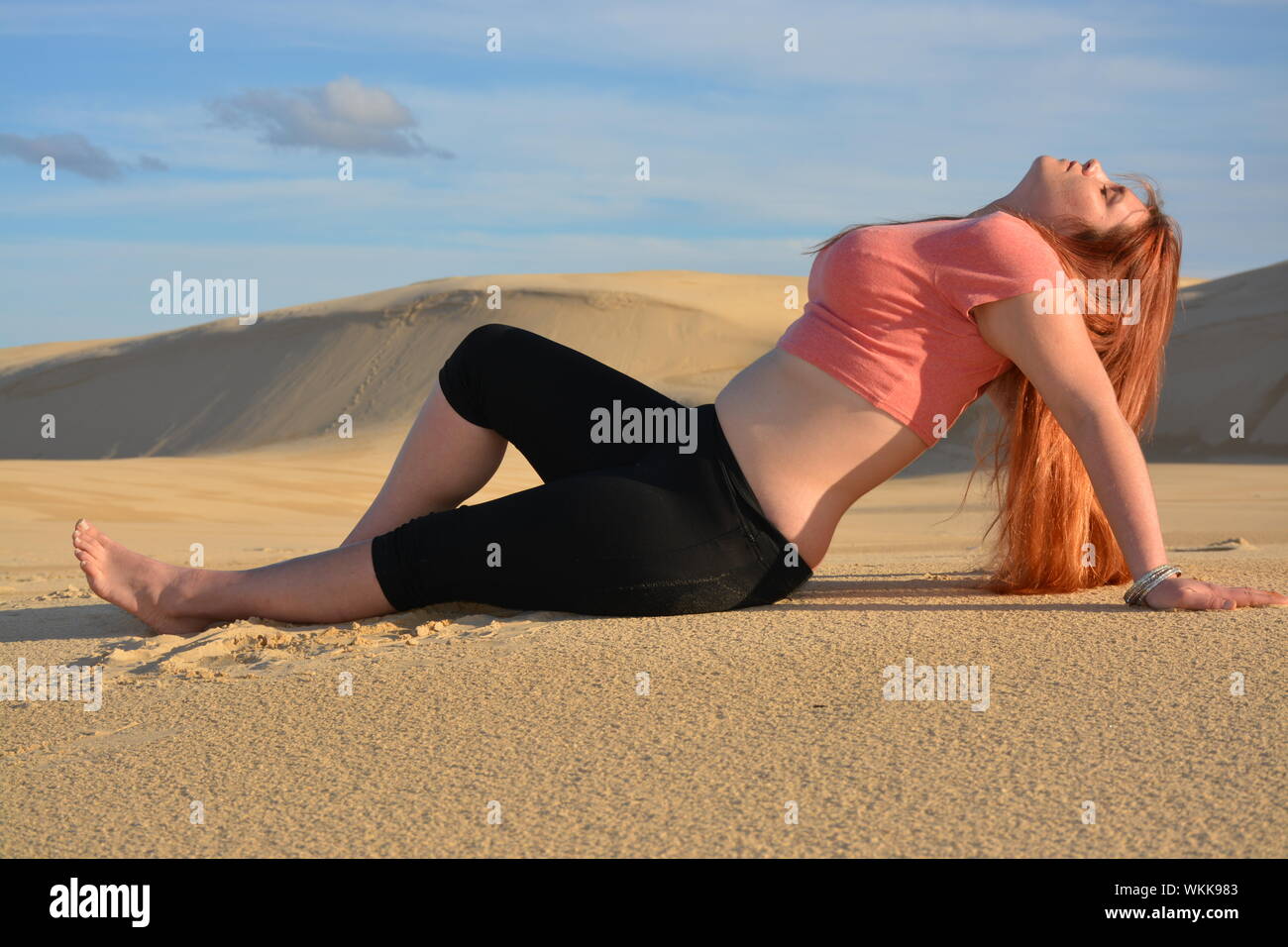 Woman lying in desert hi-res stock photography and images - Alamy