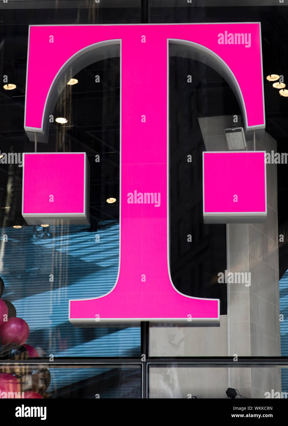 Detail of the T-Mobile store in New York, USA. T-Mobile is the brand name Deutsche Telekom, founded at 1999. Stock Photo