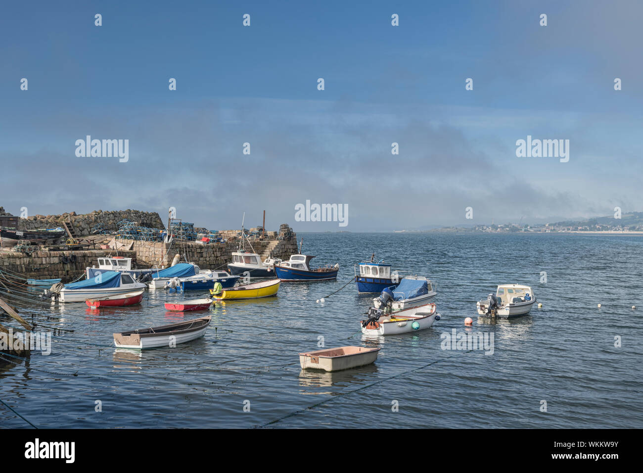 Small fishing boats in the harbour at Pettycur Bay, Kinghorn, Fife, Scotland Stock Photo