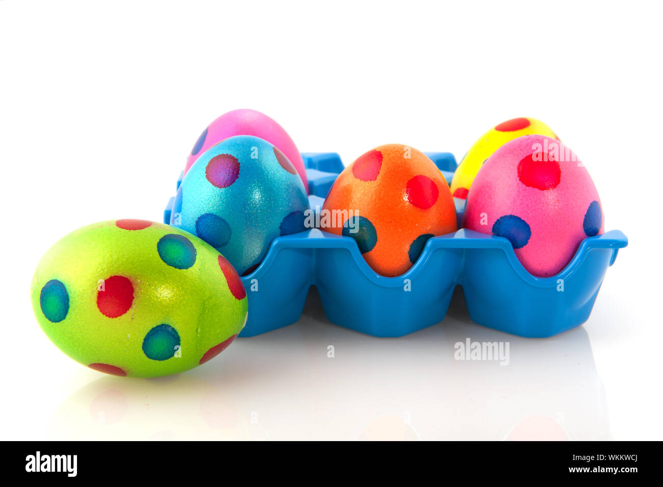 Colorful easter eggs in blue tray isolated over white Stock Photo - Alamy