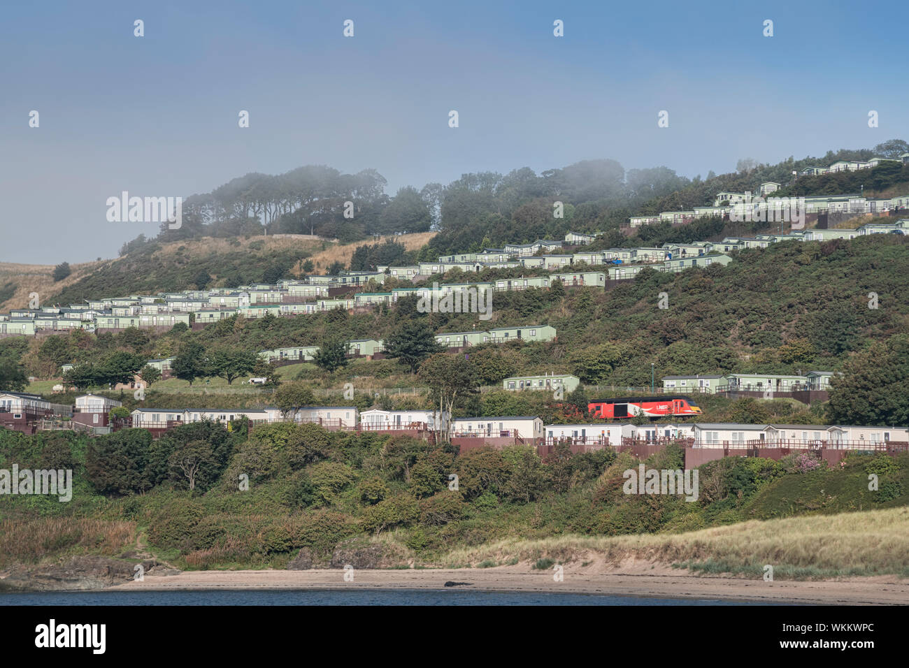 Sea mist or haar over Caravan Parks at Pettycur Bay, Kinghorn, Scotland