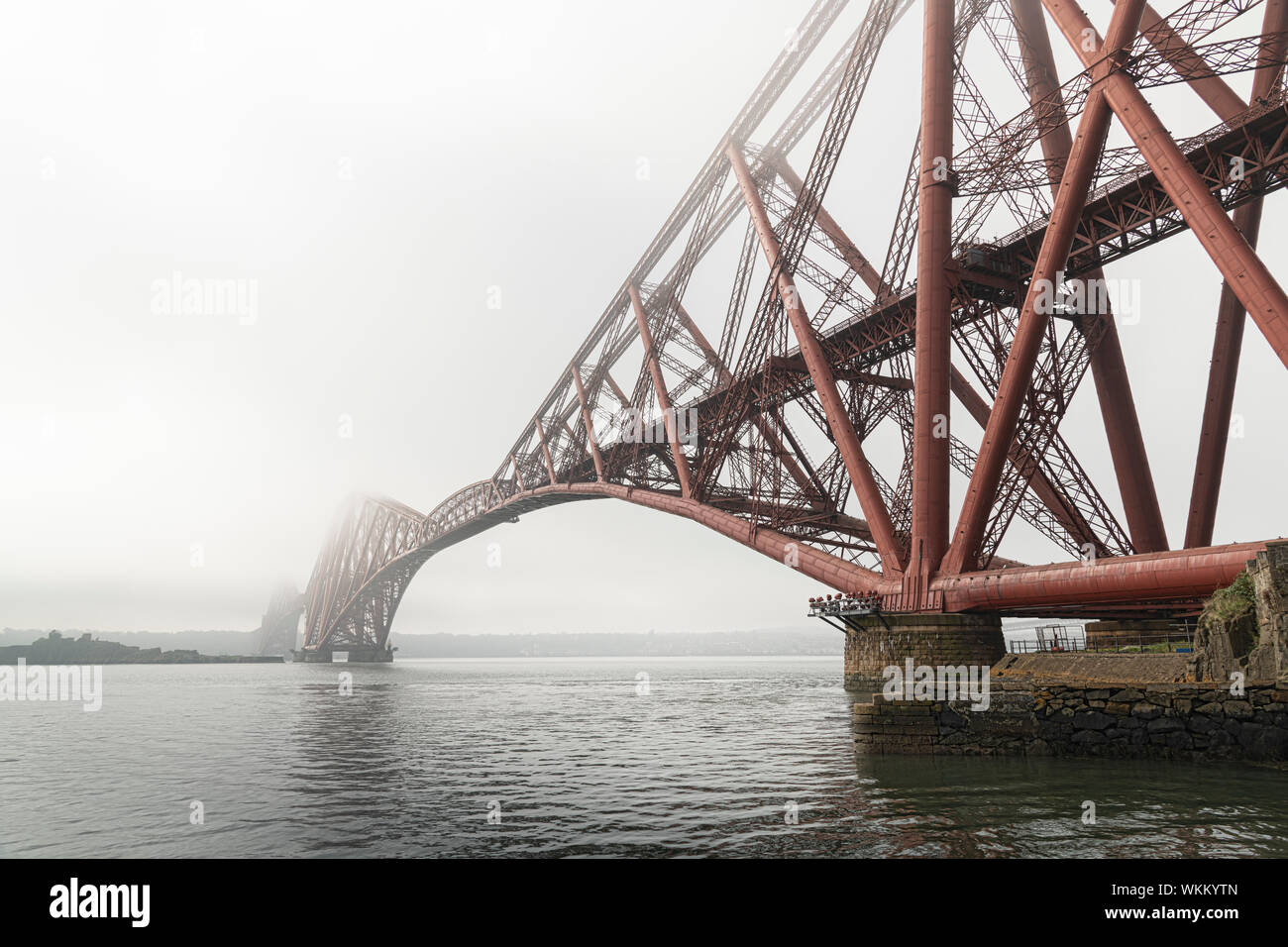 The Forth Bridge from North Queensferry on a misty day Stock Photo