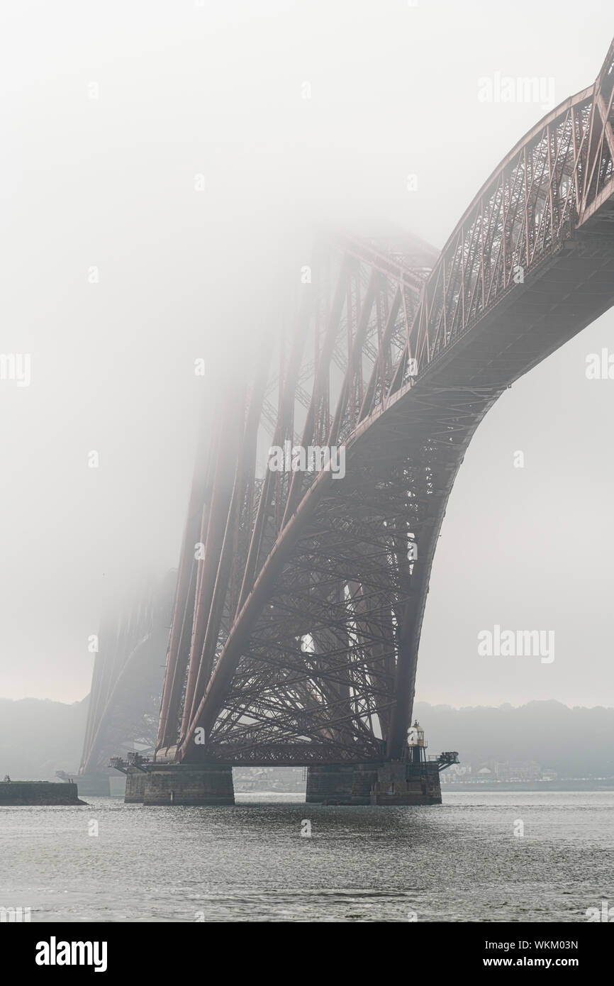 The Forth Bridge from North Queensferry on a misty day Stock Photo
