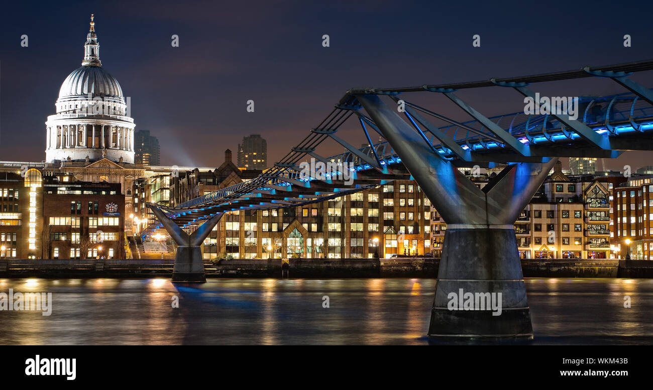 London Millennium Footbridge By St Paul Cathedral At Night Stock Photo