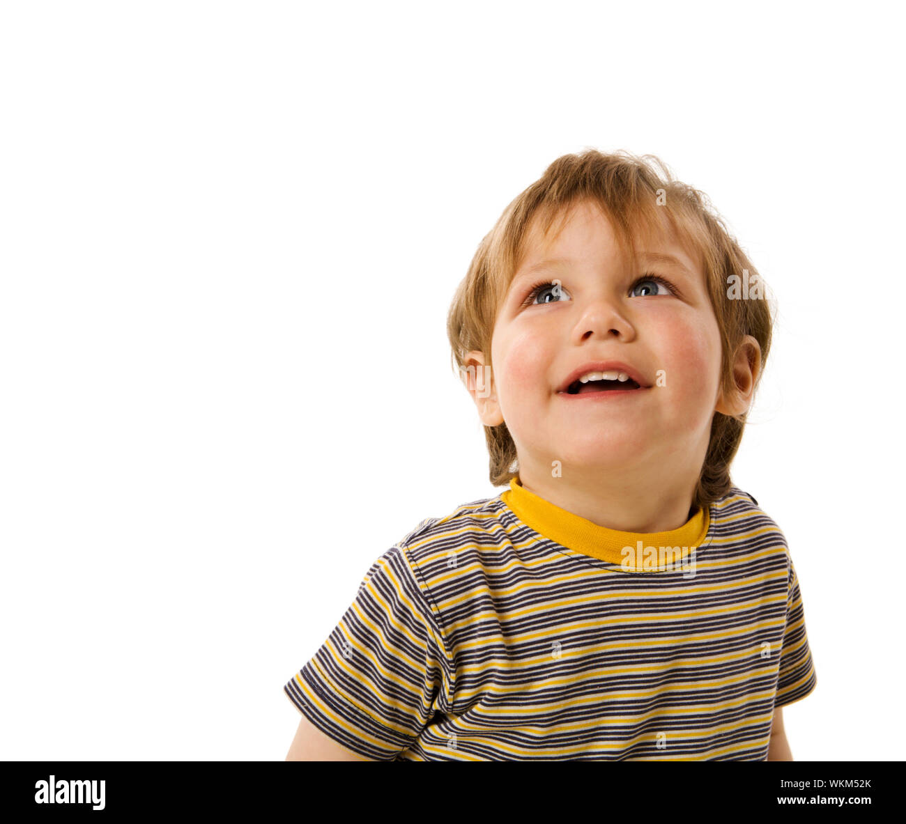 Happy Boy looking up laughing isolated on white Stock Photo Alamy