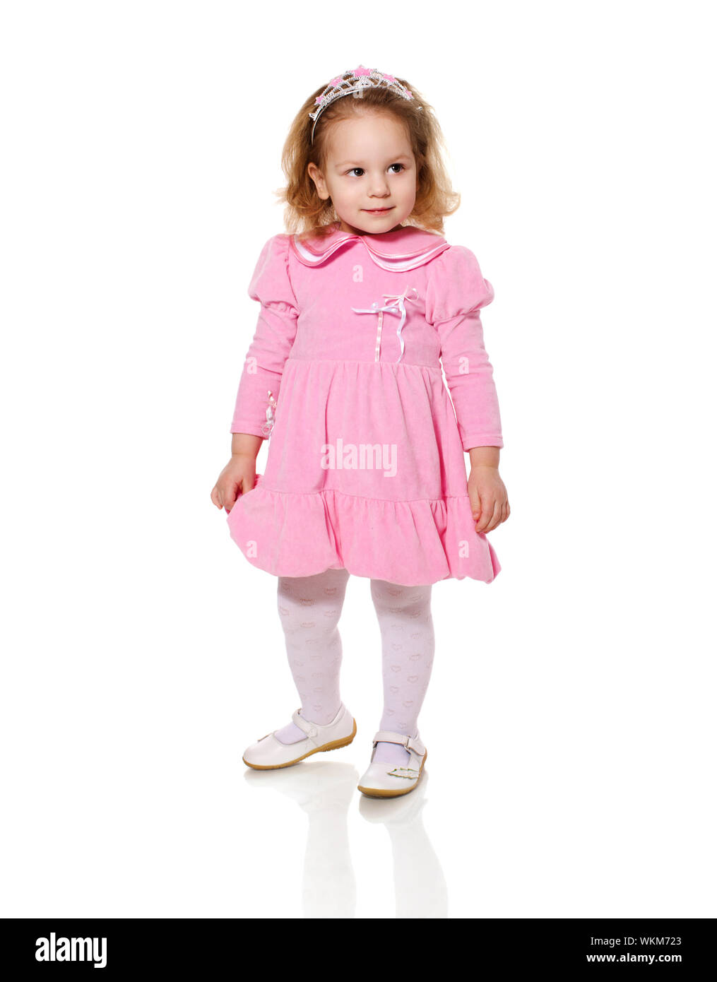 Little Girl wearing pink dress isolated on white Stock Photo - Alamy