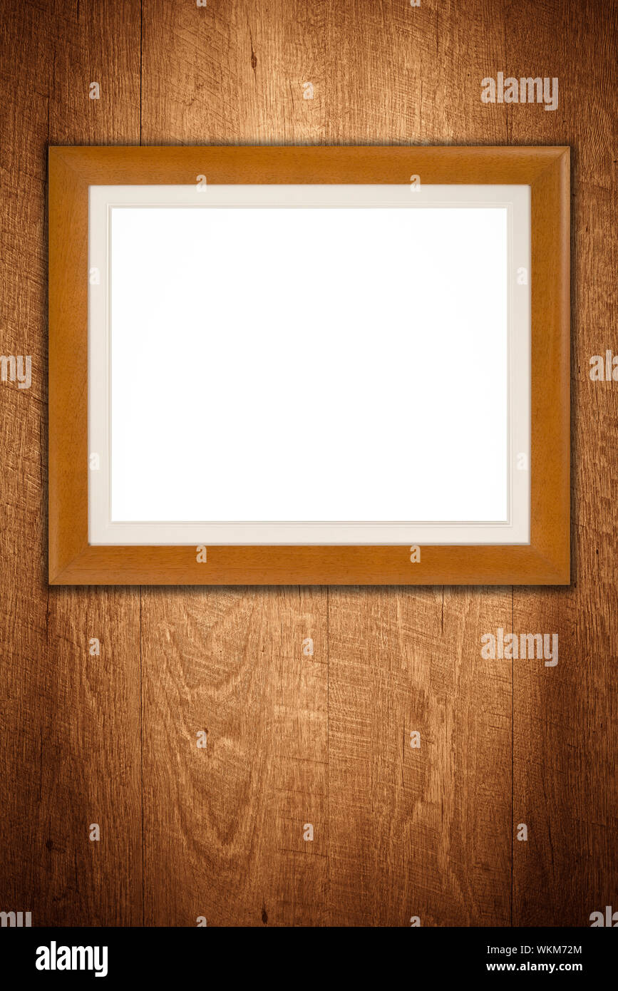 Old picture frame on vintage wood wall Stock Photo - Alamy