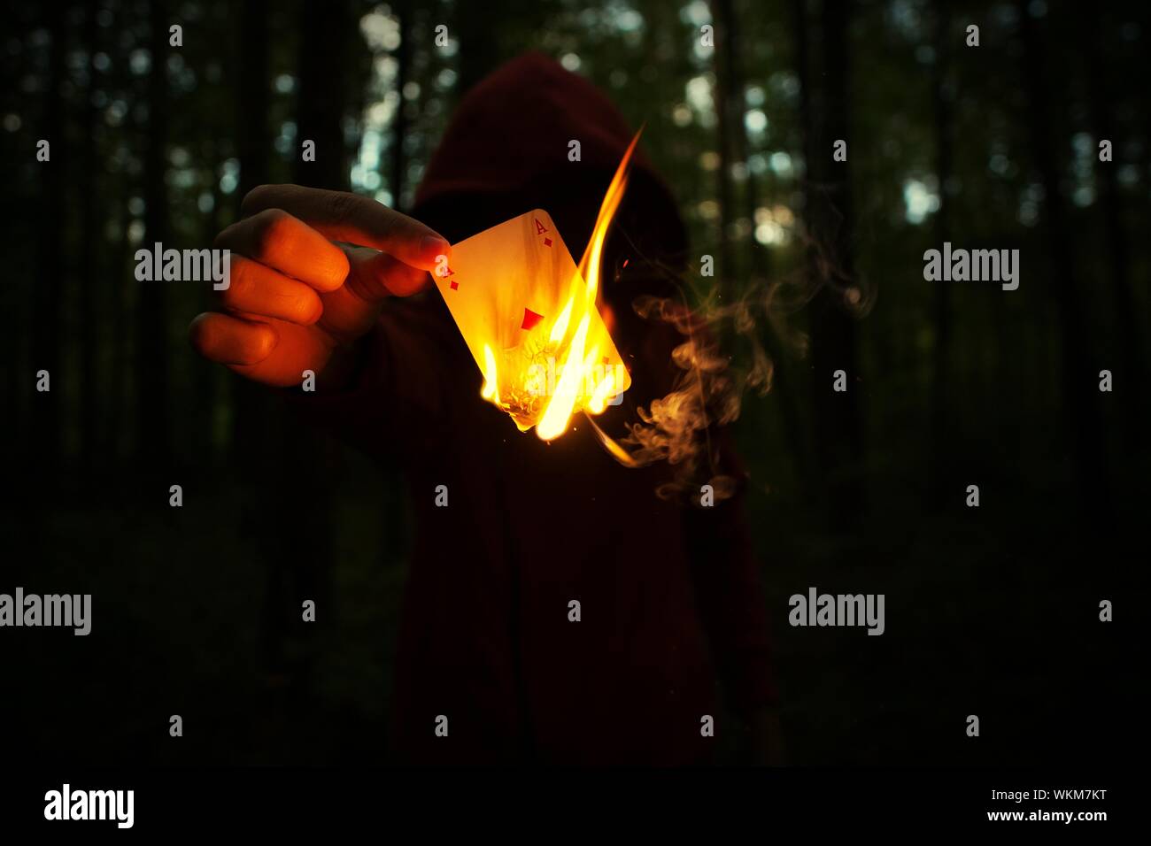 Close Up Of Person Burning Ace Card In Forest Stock Photo Alamy Close Up Of Person Burning Ace Card In Forest Stock Photo Alamy