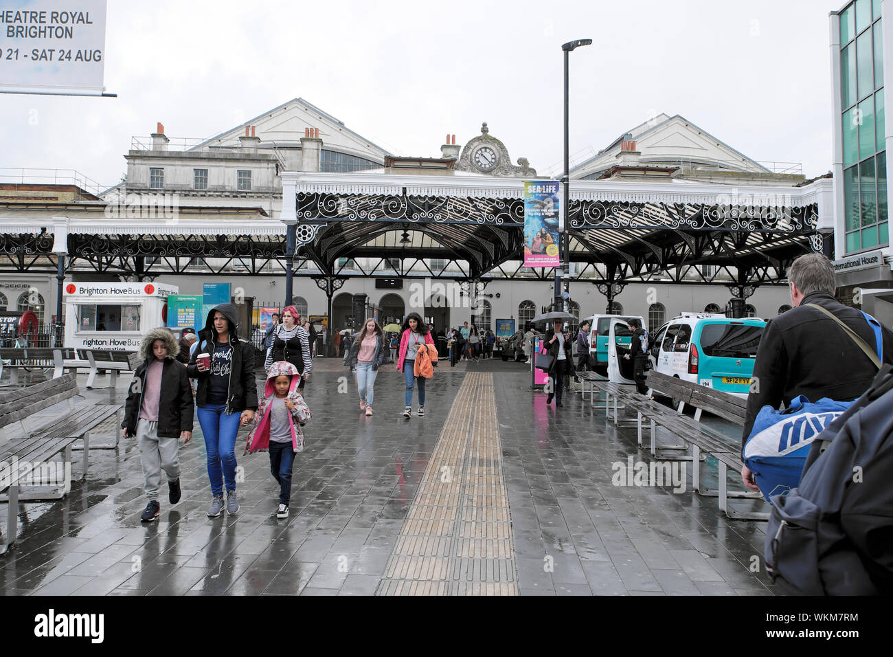 Brighton Railway Station exterior people leaving on a rainy summer day in August 2019 East Sussex, England, Great Britain UK  KATHY DEWITT Stock Photo