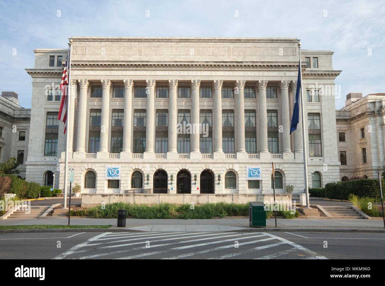 American Flag Against U S Department Of Agriculture Administration Building Stock Photo