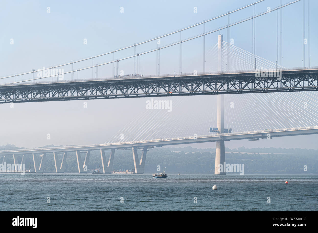 Both road bridges over The Firth of Forth on a misty day Stock Photo