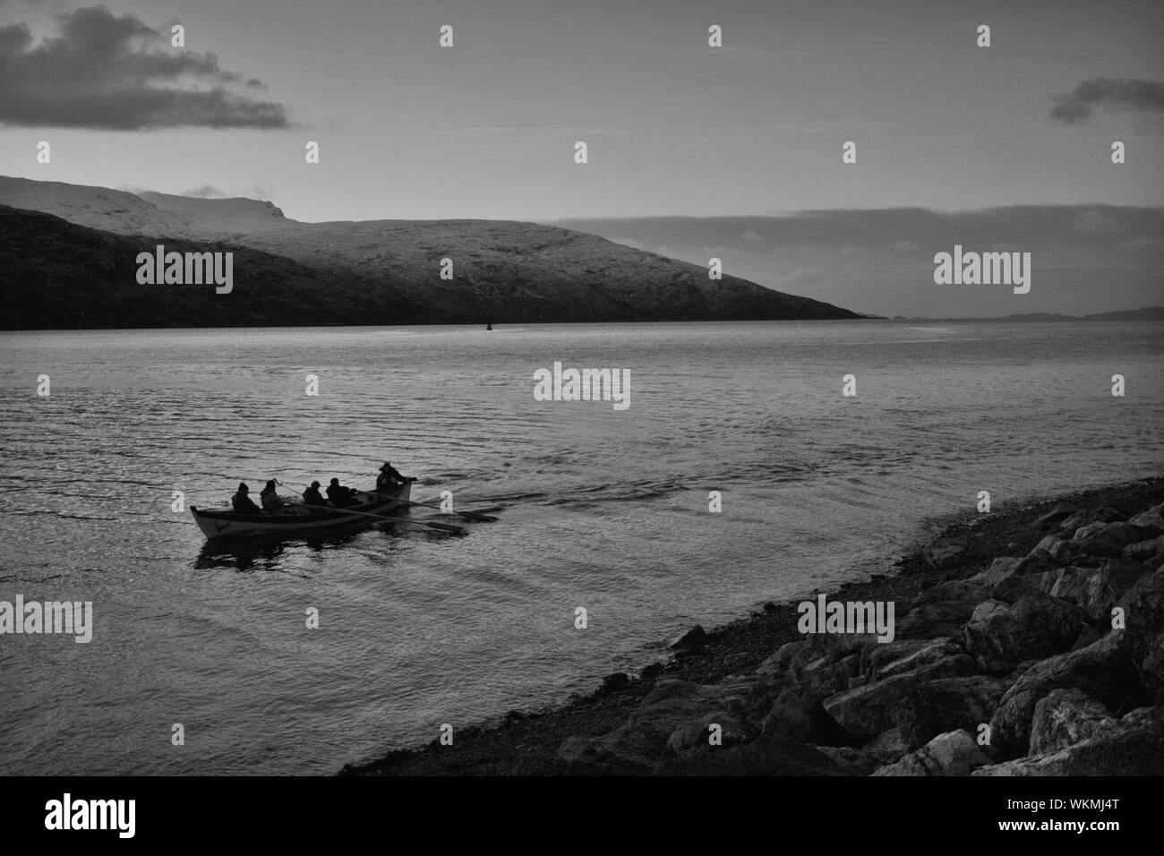 Men in rowing boat Black and White Stock Photos & Images - Alamy