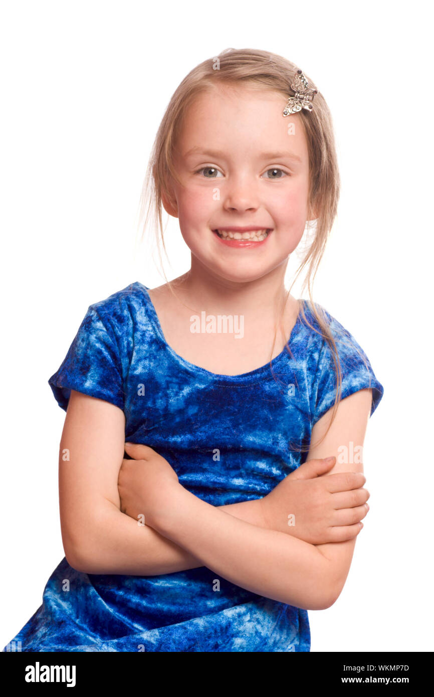 Laughing little girl wearing blue dress isolated on white Stock Photo ...