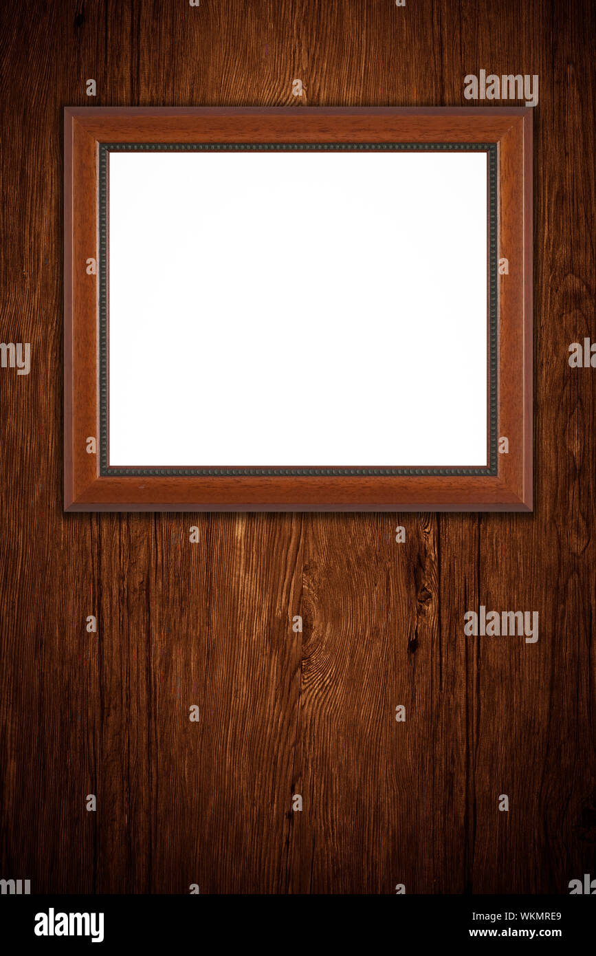 Old picture frame on vintage wood wall Stock Photo - Alamy