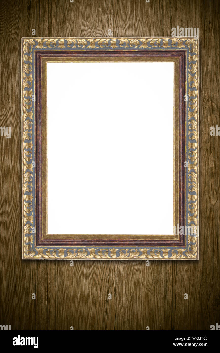 Old picture frame on vintage wood wall Stock Photo - Alamy