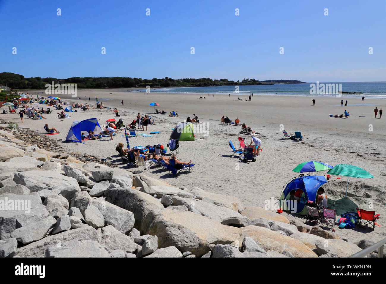 Beach goers on Higgins Beach.Scarborough.Maine.USA Stock Photo