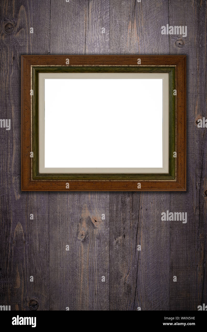 Old picture frame on vintage wood wall Stock Photo - Alamy