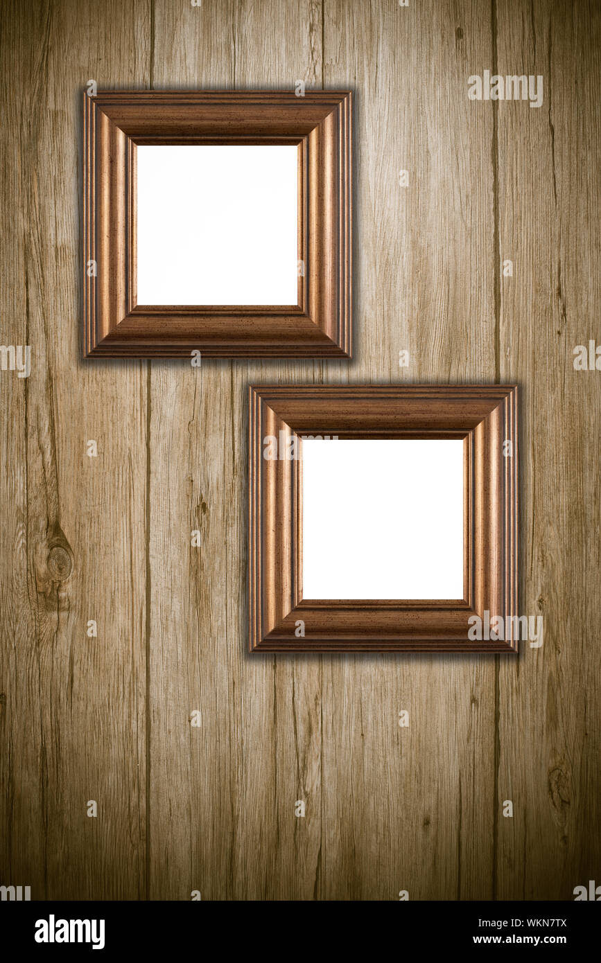 Old picture frame on vintage wood wall Stock Photo - Alamy