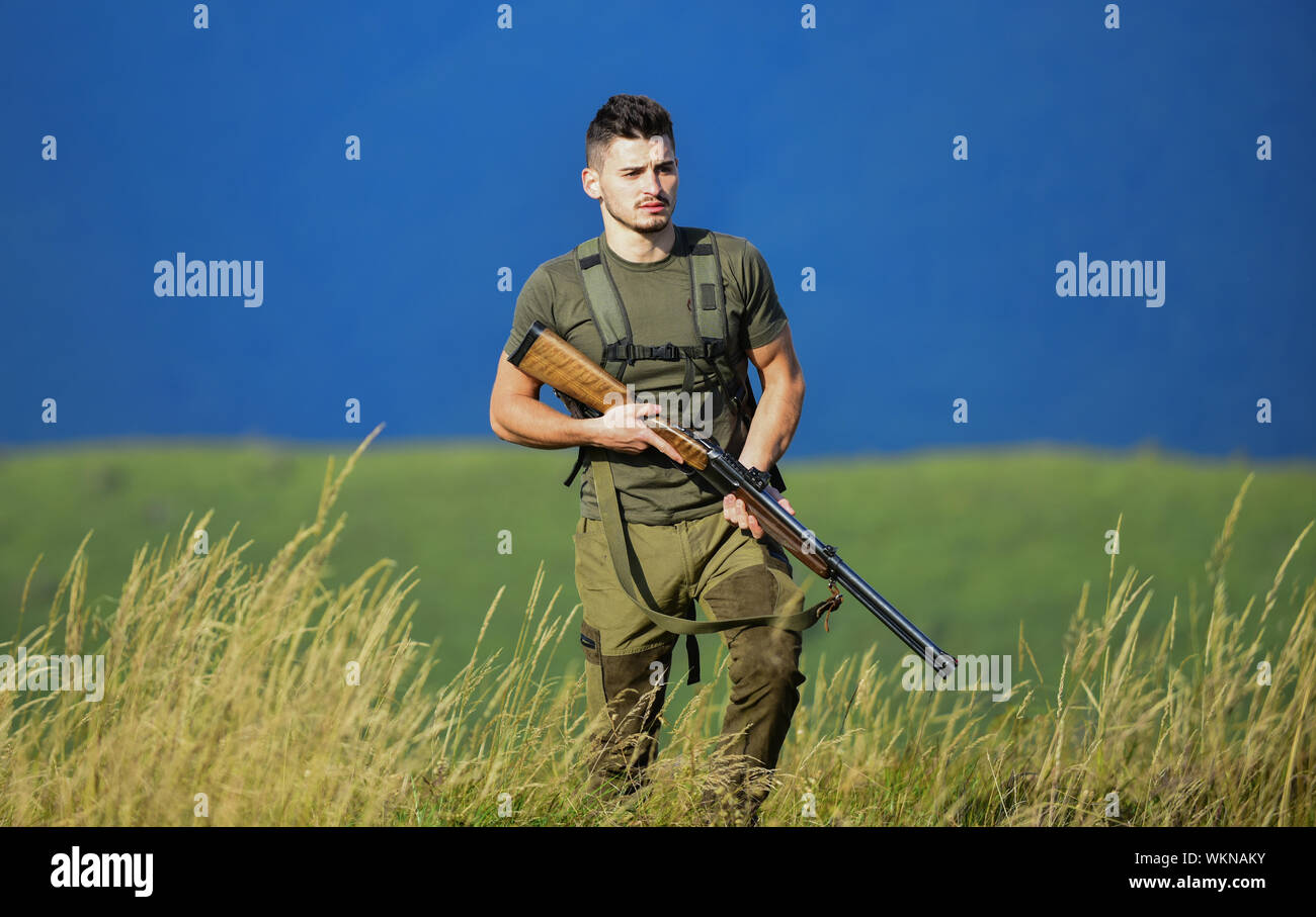 Guard the borders. Soldier with rifle. Army forces. State border guard  service. Protecting borders of motherland. Stop illegal immigrants. Man  with weapon military clothes in field nature background Stock Photo - Alamy