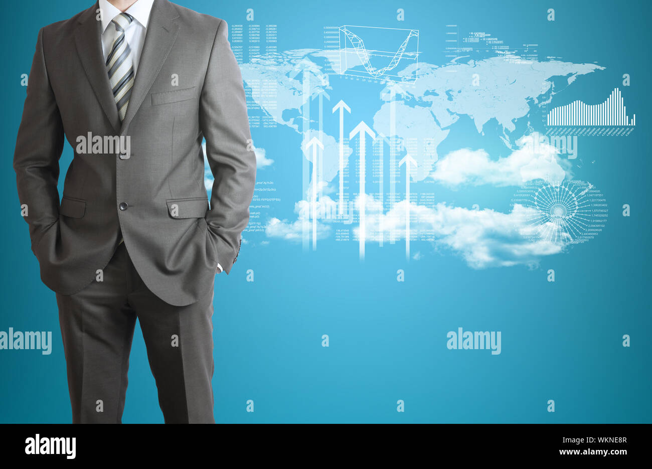 World map data graphs in hi res - Businessman In Suit World Map Clouds And Graphs As Backdrop WKNE8R