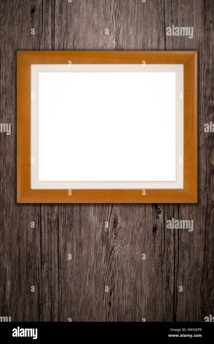 Old picture frame on vintage wood wall Stock Photo - Alamy