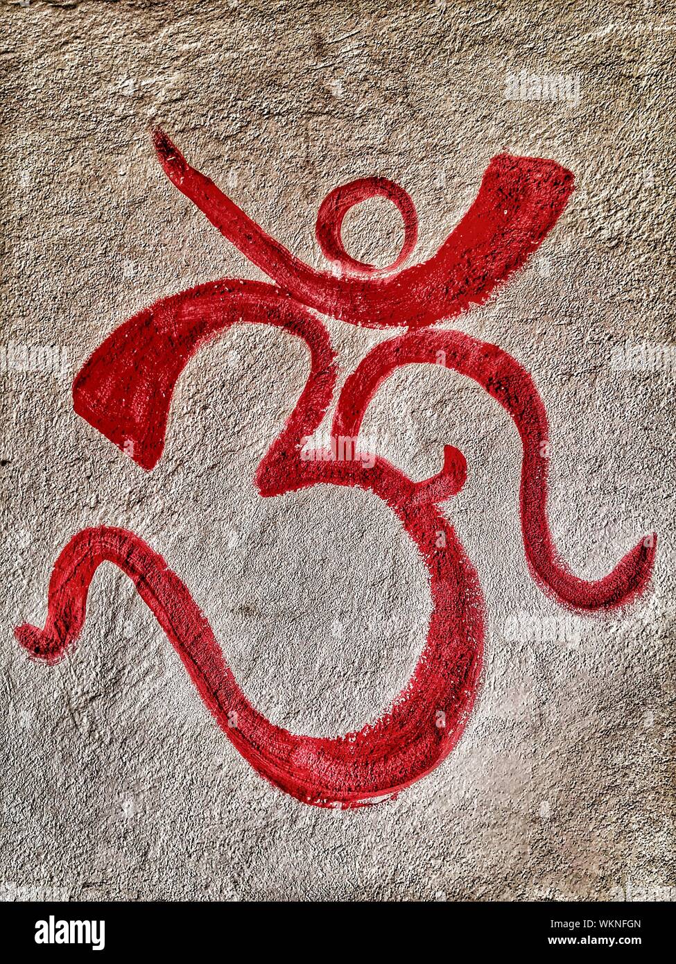 Close-up Of Om Symbol On Wall Stock Photo