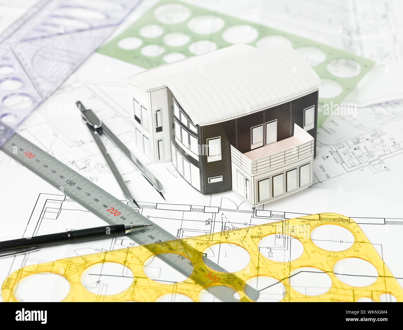 Drawing compass, pen and ruler on blueprints Stock Photo - Alamy