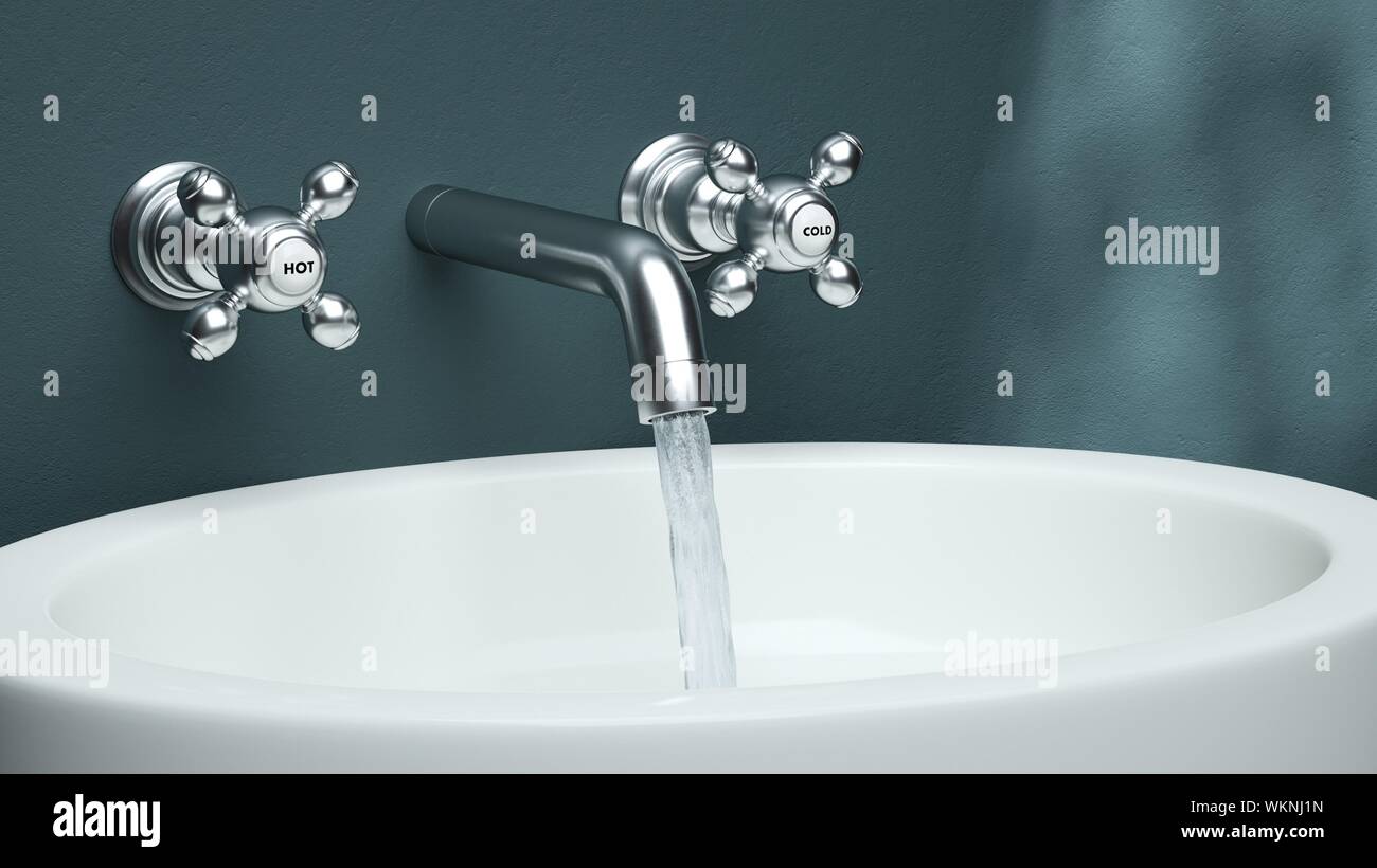Close Up Of Water Dripping From Faucet In Sink Stock Photo