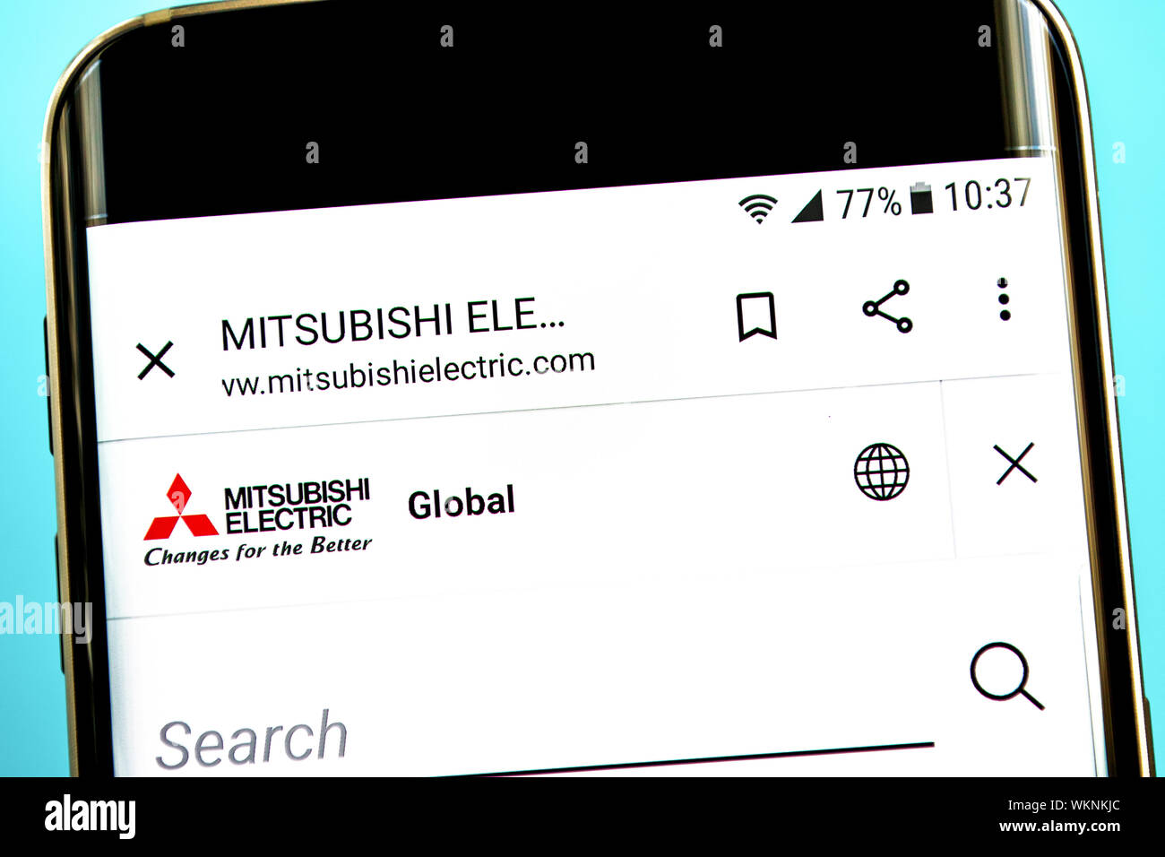 Berdyansk, Ukraine - August 1, 2019: Illustrative Editorial, Mitsubishi Electric website homepage. Mitsubishi Electric logo visible on the phone scree Stock Photo
