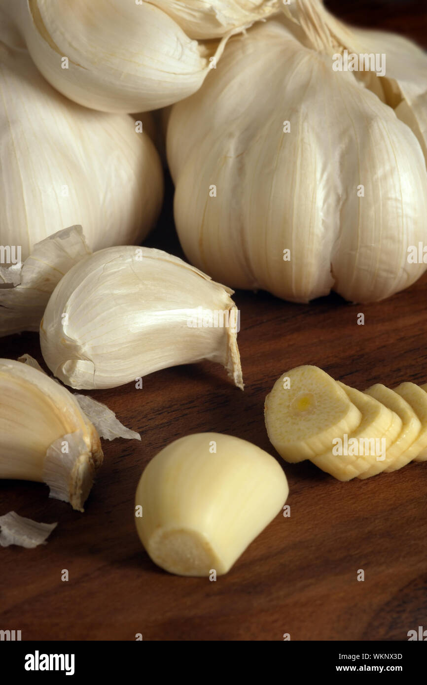 Cloves and sliced garlic Stock Photo Alamy
