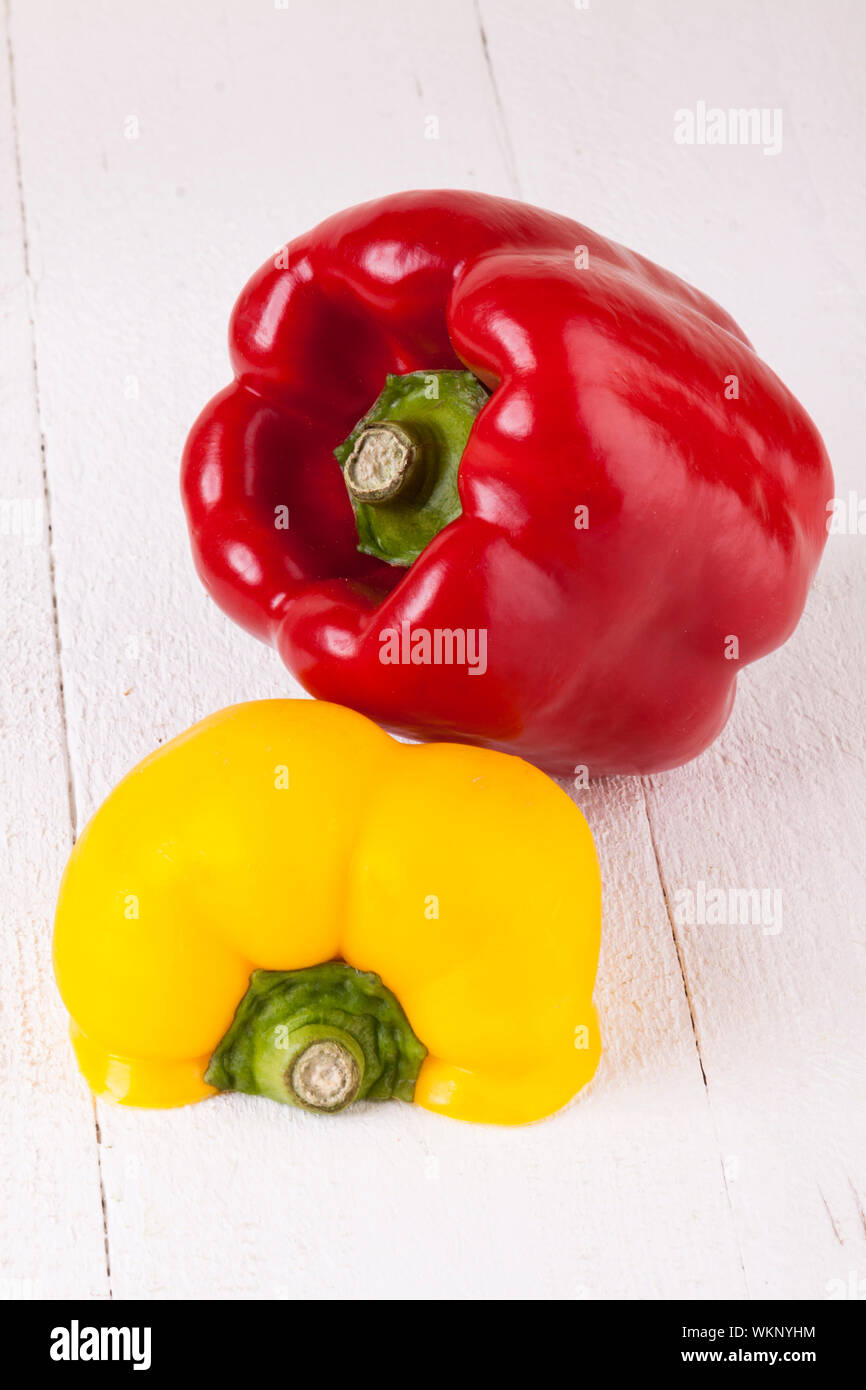 Red and Yellow Peppers on White Background Stock Photo - Alamy