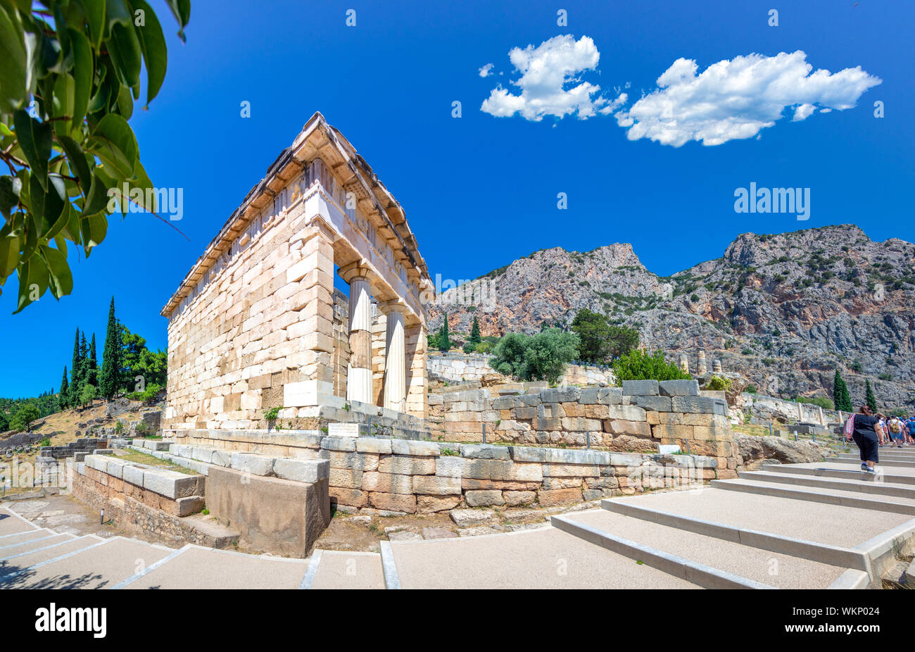 Ancient city of Delphi with ruins of the temple of Apollo, the omfalos (center) of the earth, theater, arena and other buildings, Greece Stock Photo