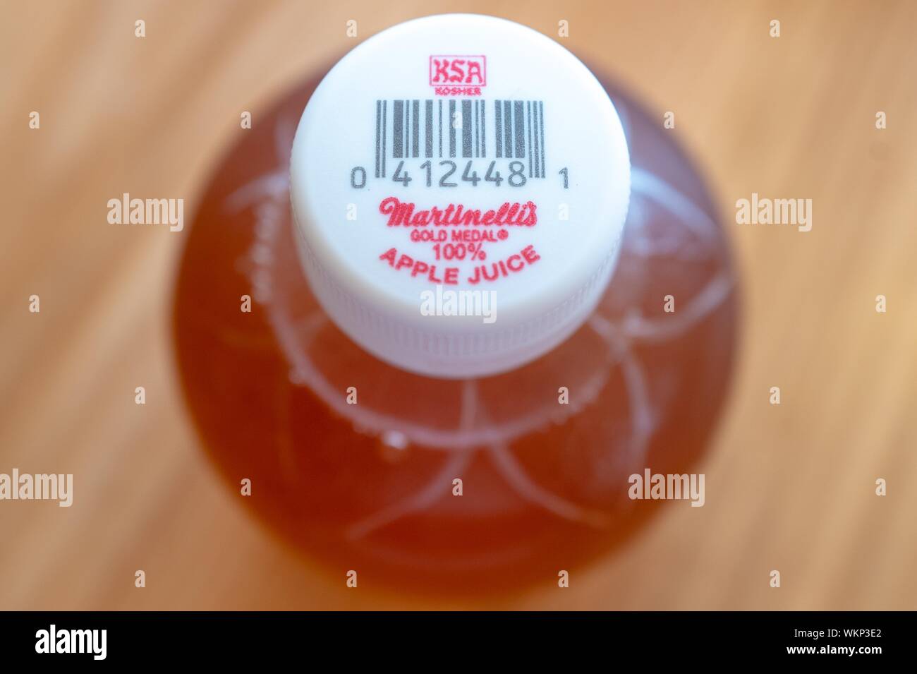 Close-up of logo for KSA Kosher certification on top of Martinelli's apple juice bottle, September 2, 2019. () Stock Photo