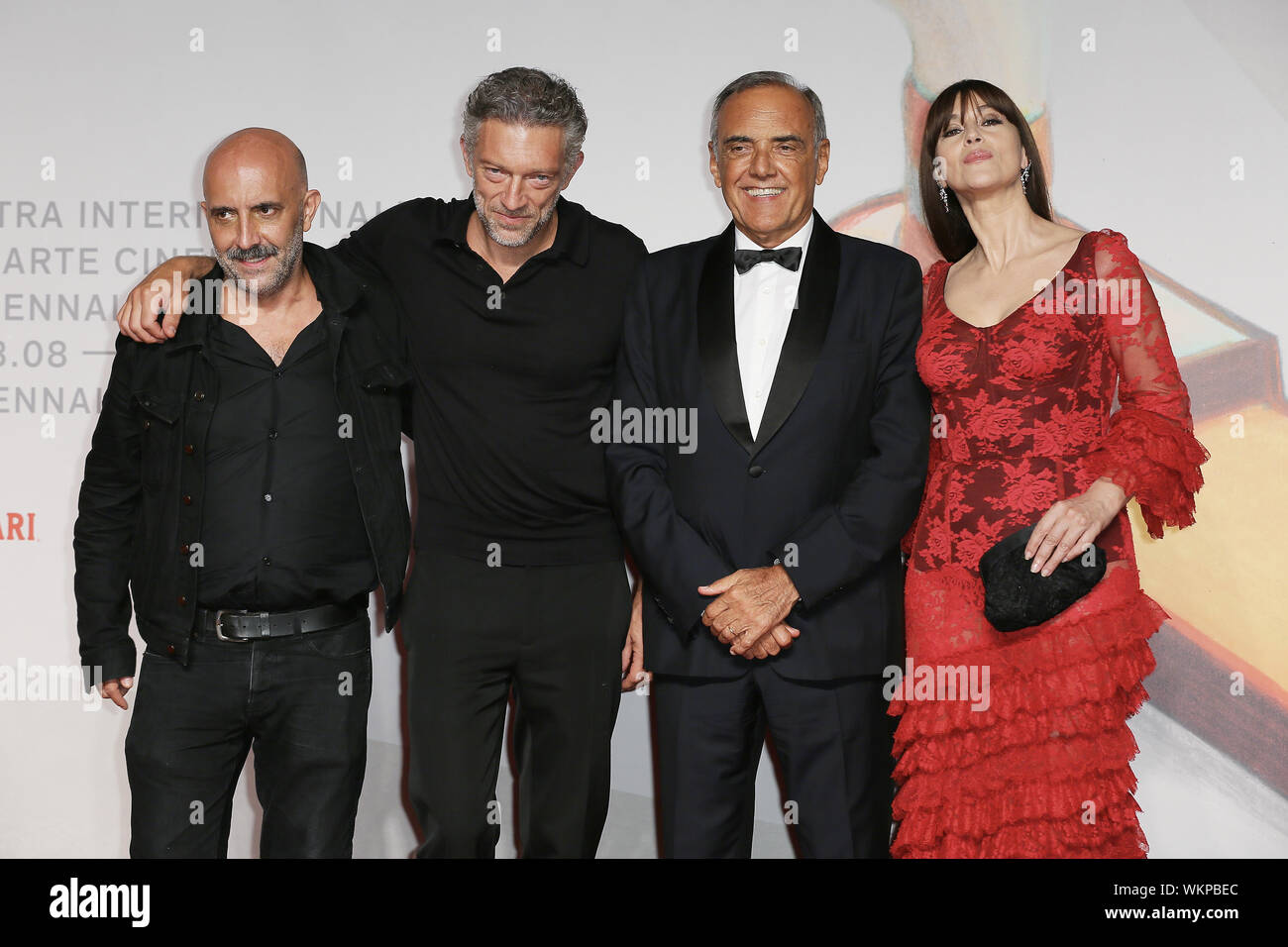 VENICE, ITALY - AUGUST 31:    Gaspard Noe, Vincent Cassel, Alberto Barbera and Monica Bellucci attends the "Irreversible" Red Carpet on the red carpet Stock Photo