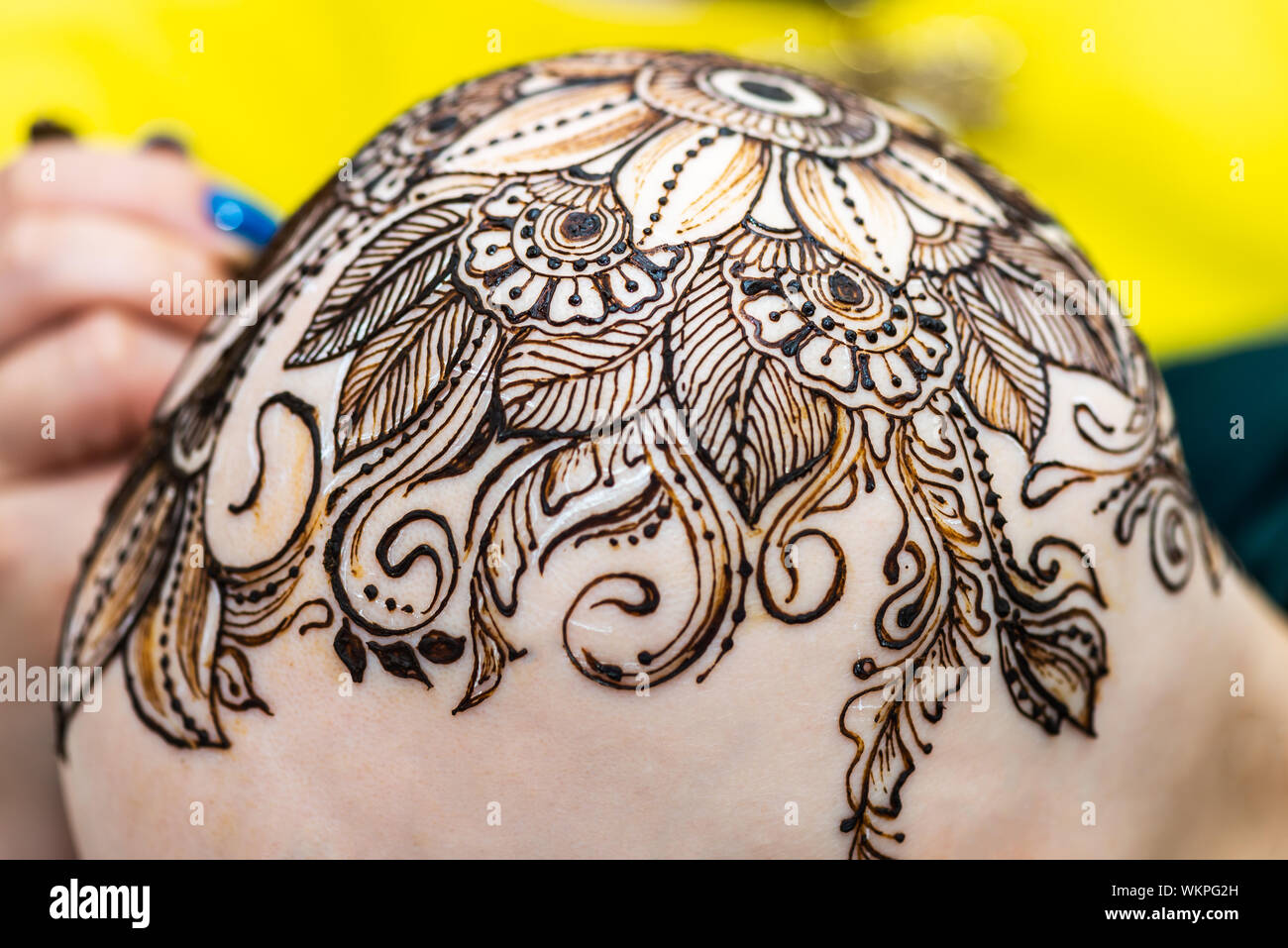 Drawing Process Of Henna Mehndi Tattoo On Womans Bald Head Stock Photo Alamy