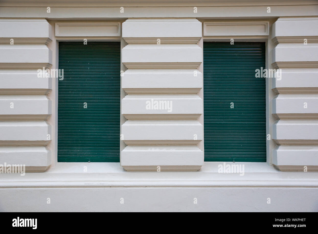 Closed Green Shutters Of House Windows Stock Photo