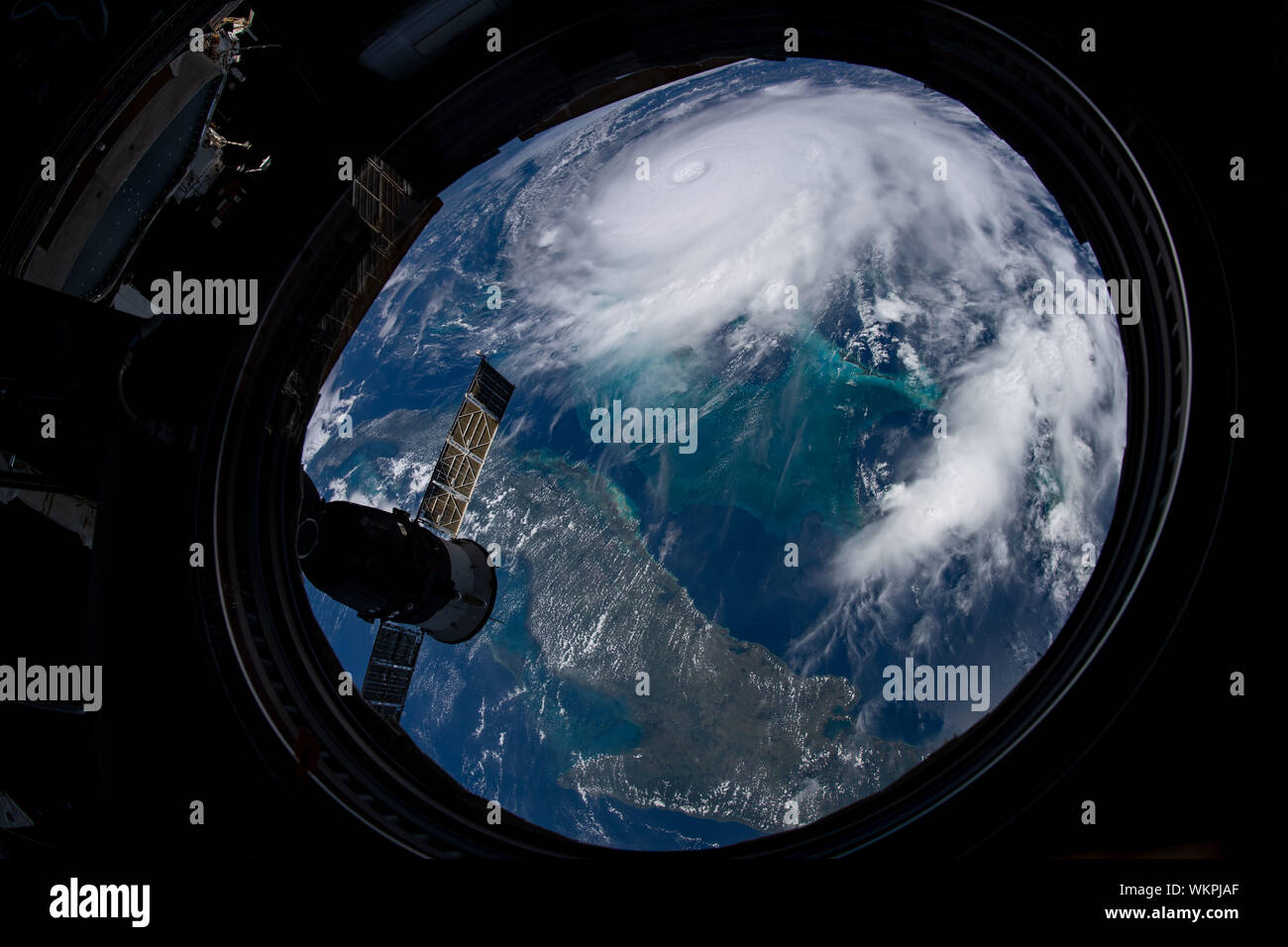 International Space Station. 02 September, 2019. Cyclonic clouds of Hurricane Dorian seen from a porthole in the International Space Station as it moves toward the coast of Florida September 2, 2019 in the Atlantic Ocean. The current forecast calls for Dorian to strengthen over open water to a Category 4 with winds of 140 mph before making landfall in South Florida late Monday.  Credit: NASA/Planetpix/Alamy Live News Stock Photo