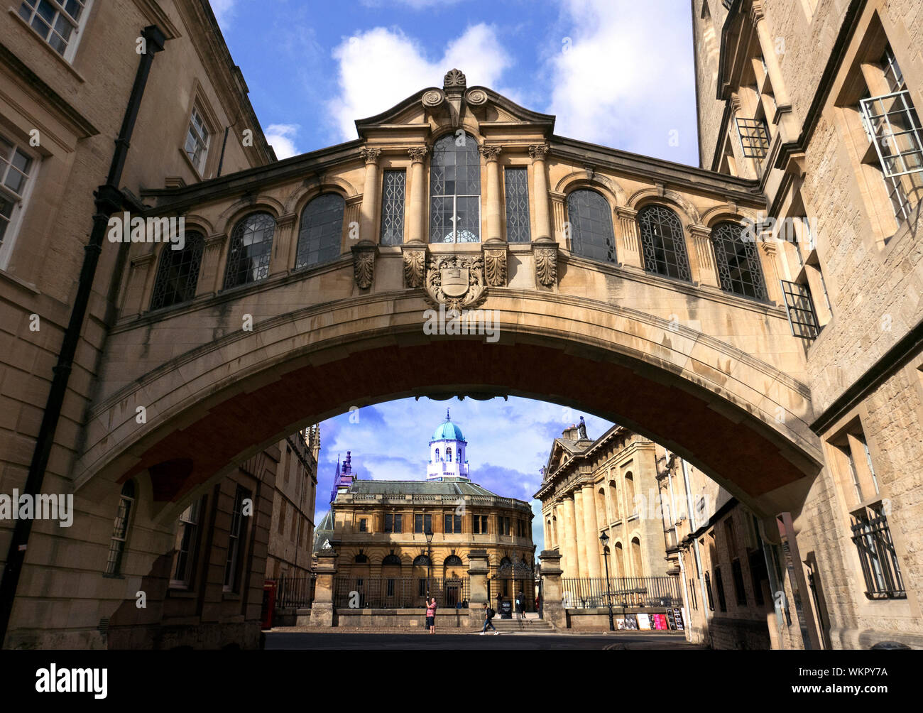 View of Sheldonian Theatre and Clarendon Building framed by Bridge of Sighs, Oxford Stock Photo