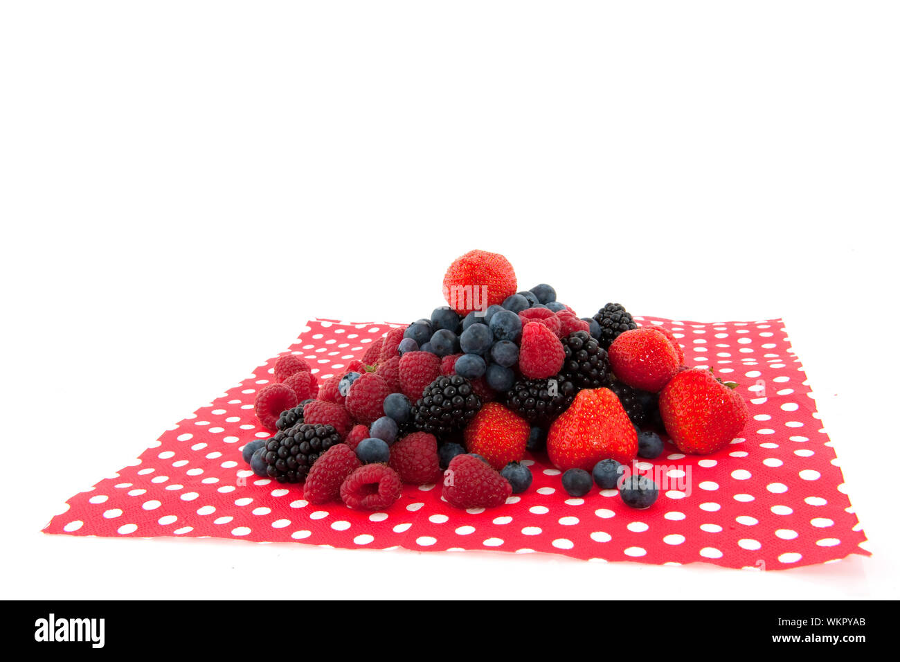 Diversity fruit in on a speckles napkin Stock Photo