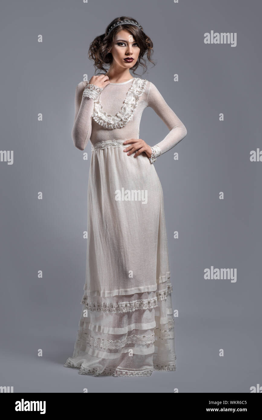 Wearing white gown hi-res stock photography and images - Alamy