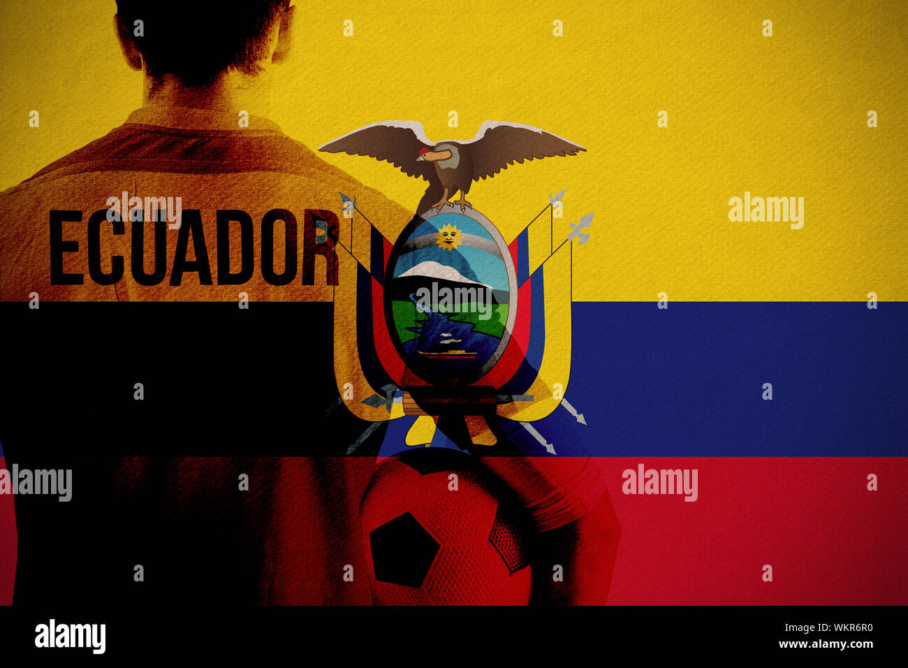Ecuador football player holding ball against ecuador national flag Stock Photo