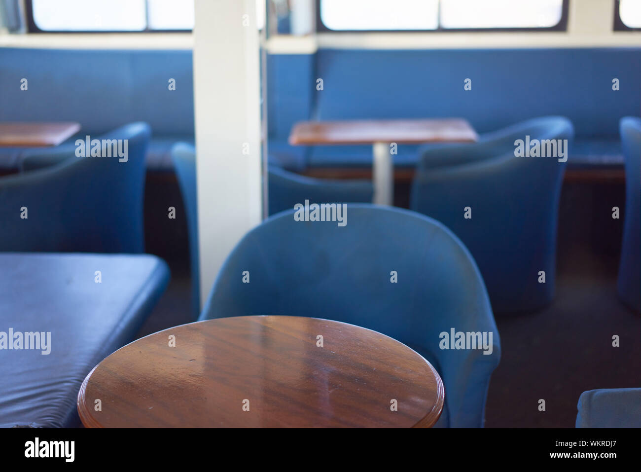 Empty Chairs And Tables At Restaurant Stock Photo