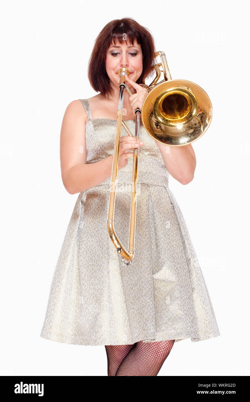 Young Female Musician Playing Trombone Isolated on White Stock Photo