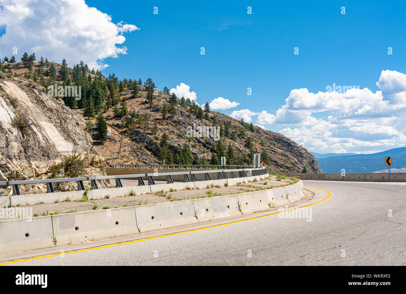 Tight bend of mountain road in Okanagan valley, British Columbia Stock ...