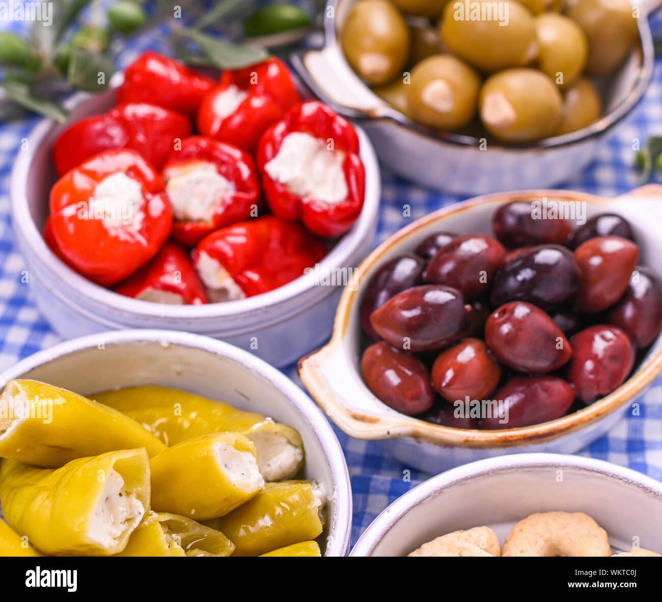 Traditional appetizers, green and red olives from Greek cuisine. Fresh