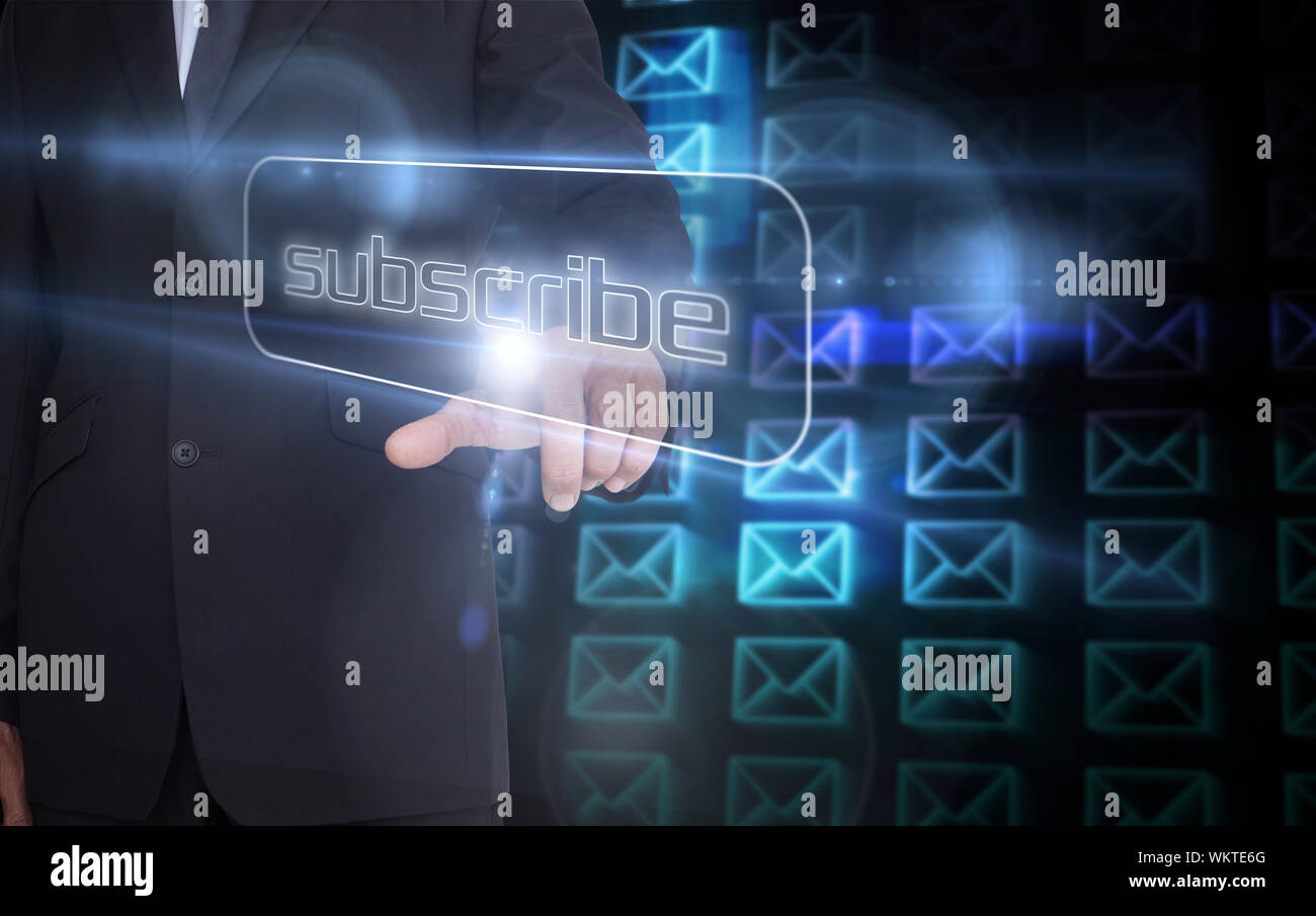 Businessman pointing to word subscribe against glowing envelopes on black background Stock Photo
