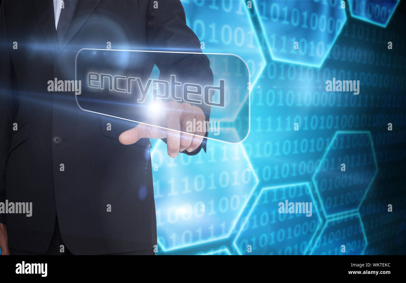 Businessman pointing to word encrypted against black background with shiny hexagons Stock Photo