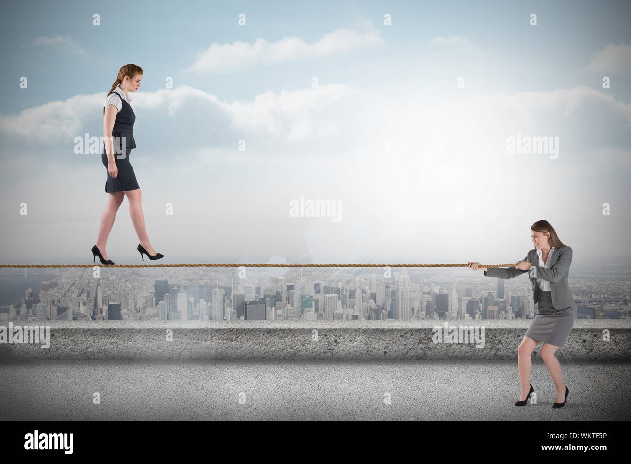 Businesswoman walking a tightrope hi-res stock photography and images -  Alamy