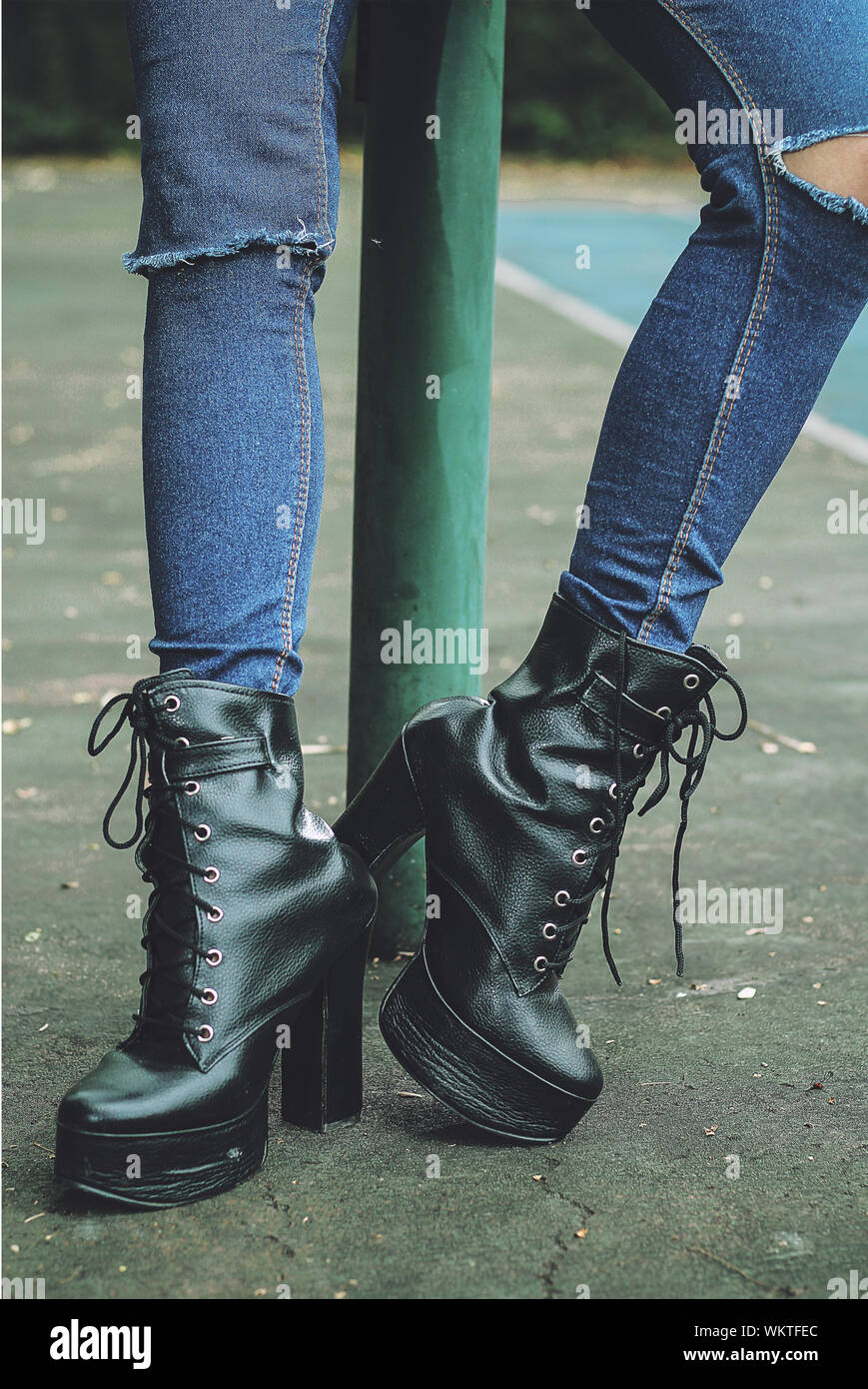 Blue jeans black black boots hi-res stock photography and images - Alamy