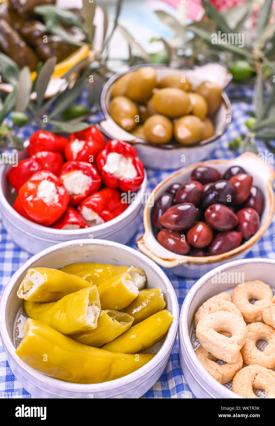 Traditional appetizers, green and red olives from Greek cuisine. Fresh
